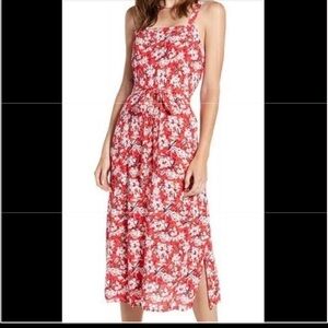 Red floral dress with pockets, tie, and slit